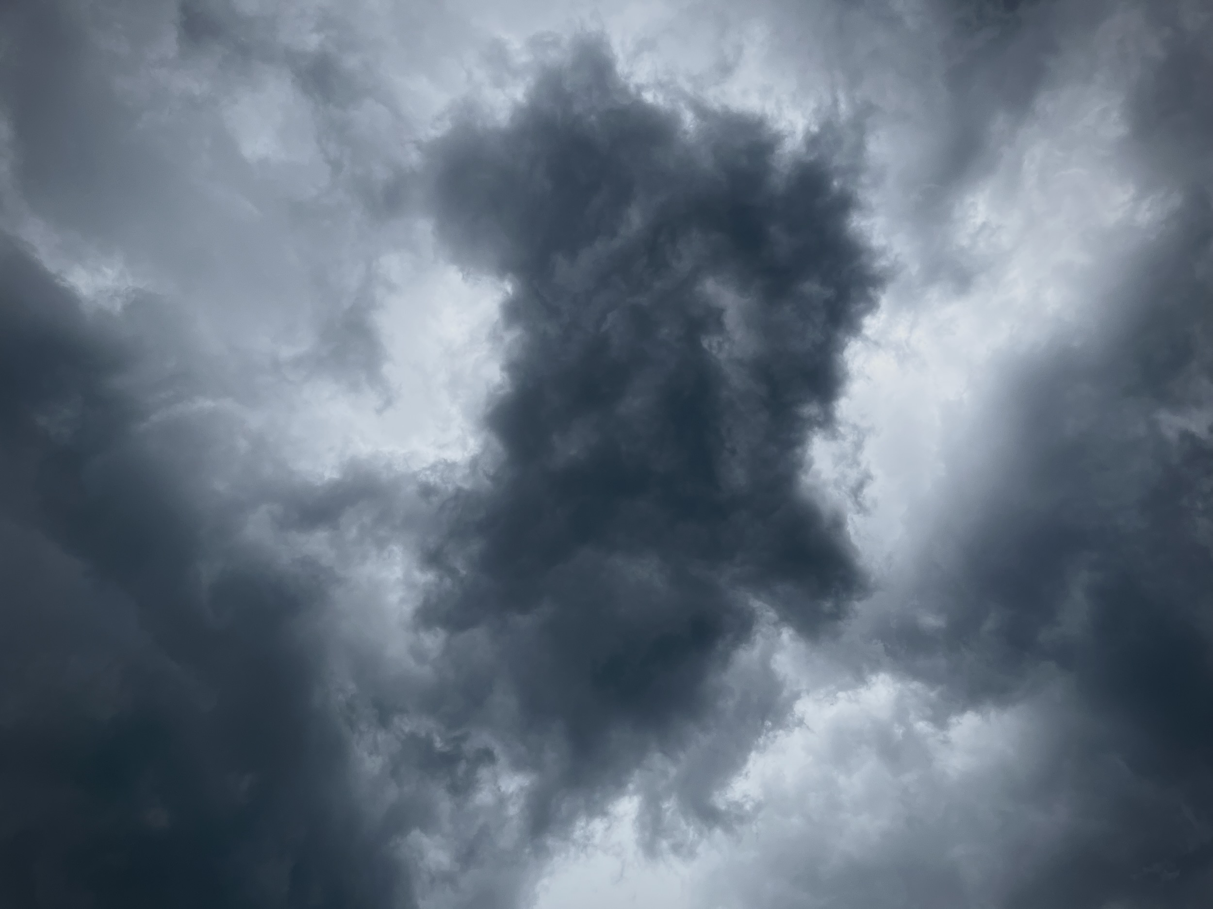 floating cloud, pale and isolated.